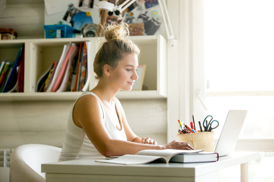 college girl on her study area