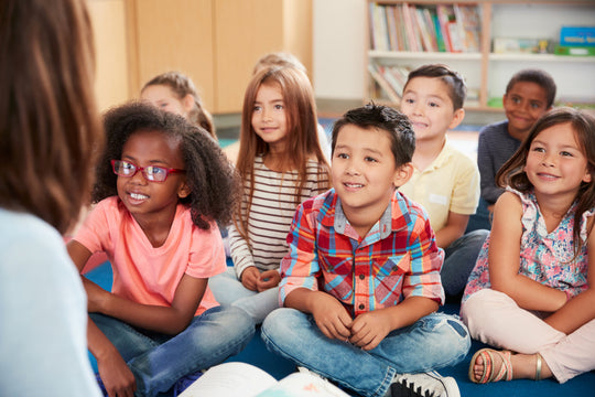kids listening to teacher complete guide to classroom organization